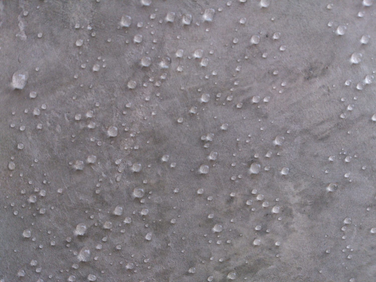Water droplets on concrete